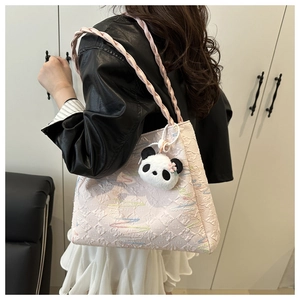 Pink jacquard tote bag with woven rope handles and cute panda plush keychain detail
