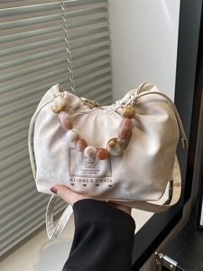 Sac Seau pour Femmes en Cuir PU Poignée Perlée Cordon de Serrage Sac Bandoulière Élégant Imprimé Lettres