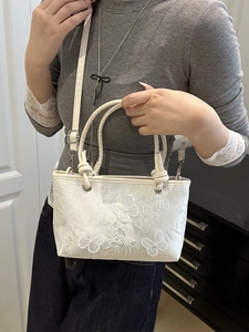 White floral lace bucket bag with 3D butterfly appliques and woven handles for women