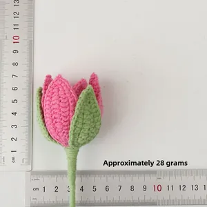 Detailed size measurement of a handmade pink crochet lotus flower showing 13cm length