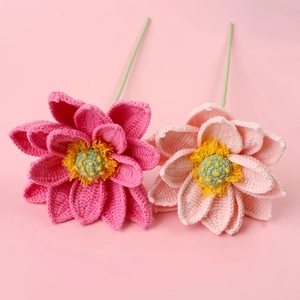Detailed macro view of handmade crochet lotus buds with intricate yarn petal textures