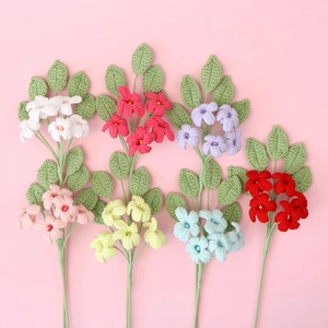 Handmade crochet jasmine bouquets in multiple colors on a soft pink background