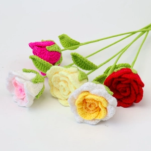 Handcrafted crochet rose bouquet with colorful cotton yarn flowers and green leaves