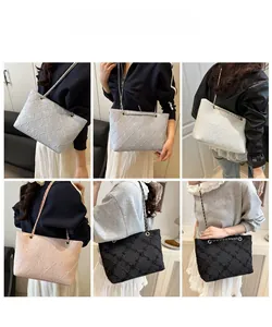 Quilted tweed tote bags in multiple colors with chain straps shown on a fashion model