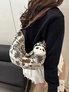 Large floral canvas crossbody bag with panda charm and brown adjustable strap for women