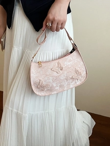 Sac à bandoulière rose avec dentelle papillon et texture en cuir pour femmes