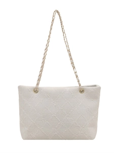 Chic white jacquard tote bag with floral patterns and gold chain shoulder strap for women