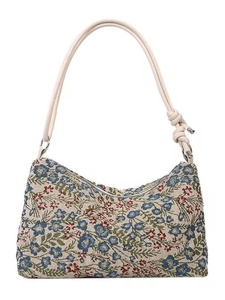 Ethnic style floral canvas underarm bag with a knotted strap and cream jacquard fabric