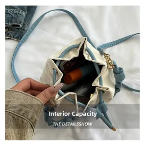 Top view showing the spacious interior of the woven bucket bag with phone and lipstick
