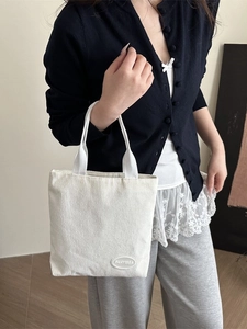 White corduroy tote bag for women with wide strap handles and stylish FANYISSA logo label