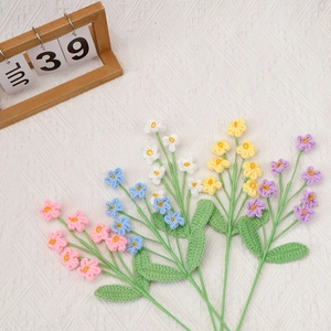 Handmade crochet forget-me-not flower bouquet in five vibrant colors for home decoration