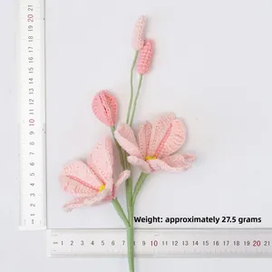Detail showing dimensions of handmade crochet pink orchid with weight measurement 27.5g