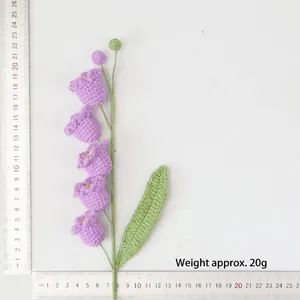 Detail of crochet lily of the valley flower with measurements showing 22cm height