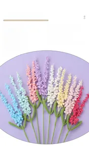 Detailed view of various colorful handmade crochet lavender flowers in diverse pastel shades