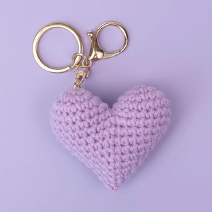 Handmade crochet heart keychain in light purple yarn with golden metal lobster clasp and ring