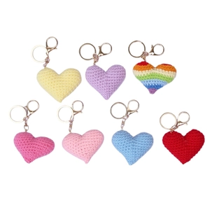 Handmade crochet heart keychains in multiple vibrant colors with golden metal ring clips