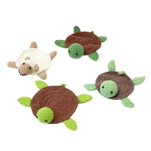 Handmade crochet turtle and sheep coasters crafted from high-quality soft wool yarn