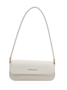Sac à épaule minimaliste en cuir blanc avec slogan de mode et détails dorés