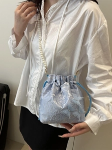 Light blue bucket bag with 3D butterflies and white pearl chain strap for summer
