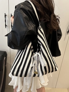 Large capacity black and white striped canvas tote bag with lace bow and metal tag