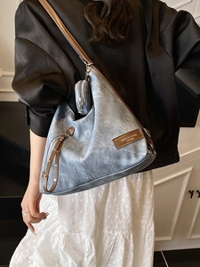 Große blaugraue Tragetasche aus Retro-Leder mit passendem Beutel und Quaste