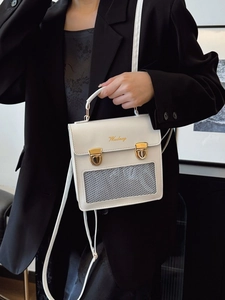 Sac ita blanc avec fenêtre transparente et logo doré, style bandoulière et sac à main
