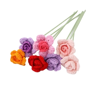 Handcrafted crochet rose and daisy bouquet in vibrant colors for home floral decoration
