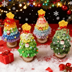 Handcrafted crochet Christmas trees with wooden bases and festive star toppers for home decor
