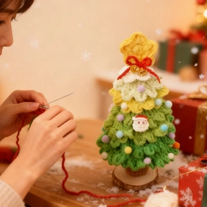 Detail of handmade crochet Christmas tree with colorful pompoms and wooden base