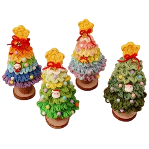 Handmade crochet Christmas tree decor set with wooden bases and colorful ornaments