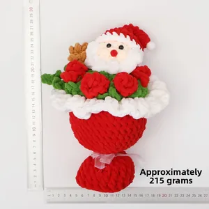 Detail of crochet Christmas bouquet with Santa doll and roses, weighing approx 215g