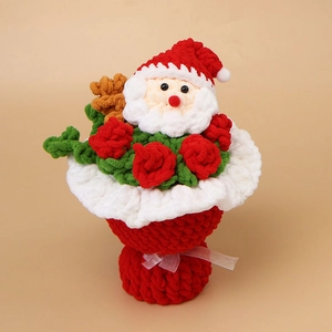 Macro detail of hand-knitted Santa Claus bouquet with red roses and festive bow tie