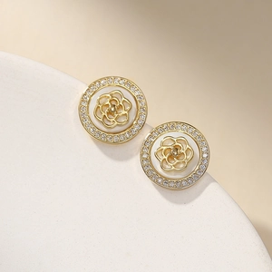 Elegant S925 silver camellia flower stud earrings with gold finish and zircon stones