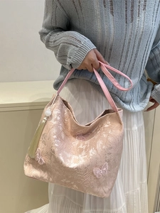 Pink jacquard tote bag with 3D butterfly embroidery and elegant long tassels for women