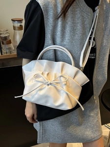 White ruched leather tote bag with bow detail, stylish crossbody bag for women