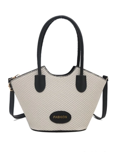 Chic cream woven bucket bag with black handles and fashion tag for women