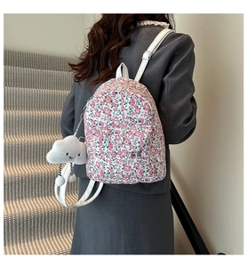Floral mini backpack for women with white faux leather straps and cloud charm