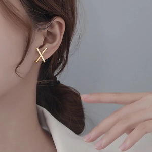 Elegant gold-plated X-shaped cross earrings for women with paved cubic zirconia stones