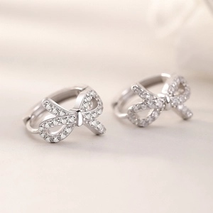 Boucles d'oreilles nœud élégantes en argent S925 avec zircons cubiques brillants