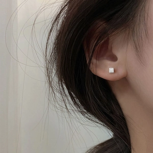 Minimalist S925 sterling silver square stud earrings with hammered texture on female ear