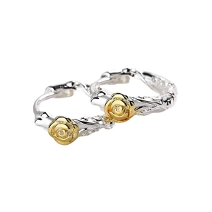 Elegant two-tone rose flower hoop earrings with intricate silver vine texture design