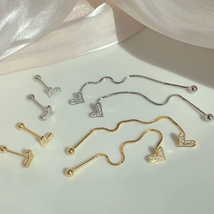 S925 silver heart stud earrings and tassel drop earrings set on silk background