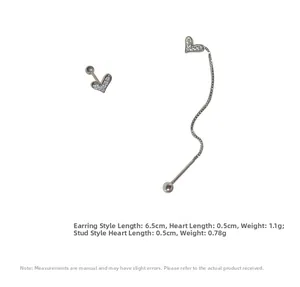 Macro detail of S925 silver asymmetric heart stud and threader earrings with cubic zirconia
