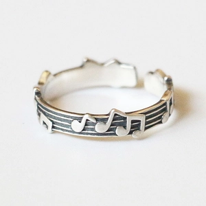 Retro S925 silver music note open ring with musical staff relief design for women