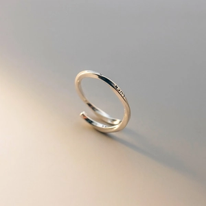 Minimalist S925 sterling silver Mobius twist ring with Luck engraving and open design