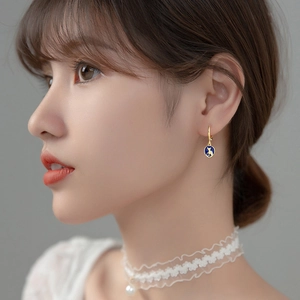 S925 silver cat charm hoop earrings with blue enamel and elegant gold-tone finish