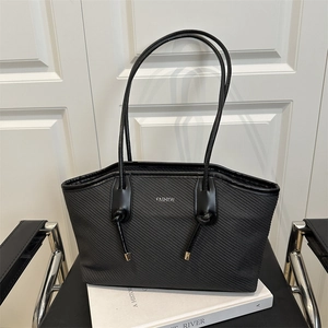 Vintage waxed leather tote bag with woven texture and silver Fashion lettering
