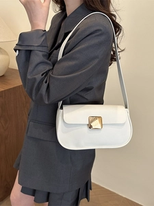 Minimalist white leather underarm bag with a bold gold square buckle for women