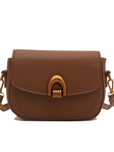 Sacoche selle classique en cuir marron caramel avec boucle métallique rétro en U