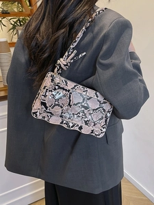 Sac bandoulière motif serpent rose et noir avec fenêtre transparente et sangle en corde